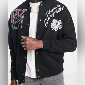 ASOS DESIGN oversized jersey jacket in black with varsity and souvenir prints L